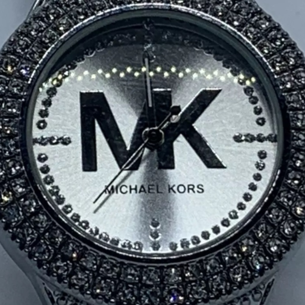 Silver MK watch